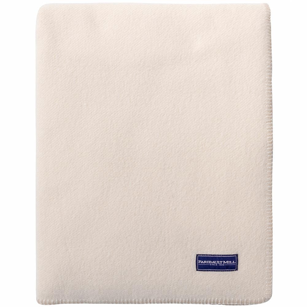 Faribault Pure & Simple Bone White wool blanket folded on white