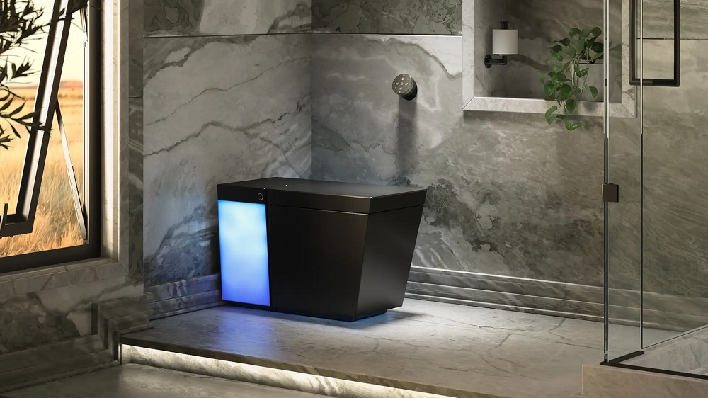 Black Kohler Numi 2.0 smart toilet in a stone bathroom