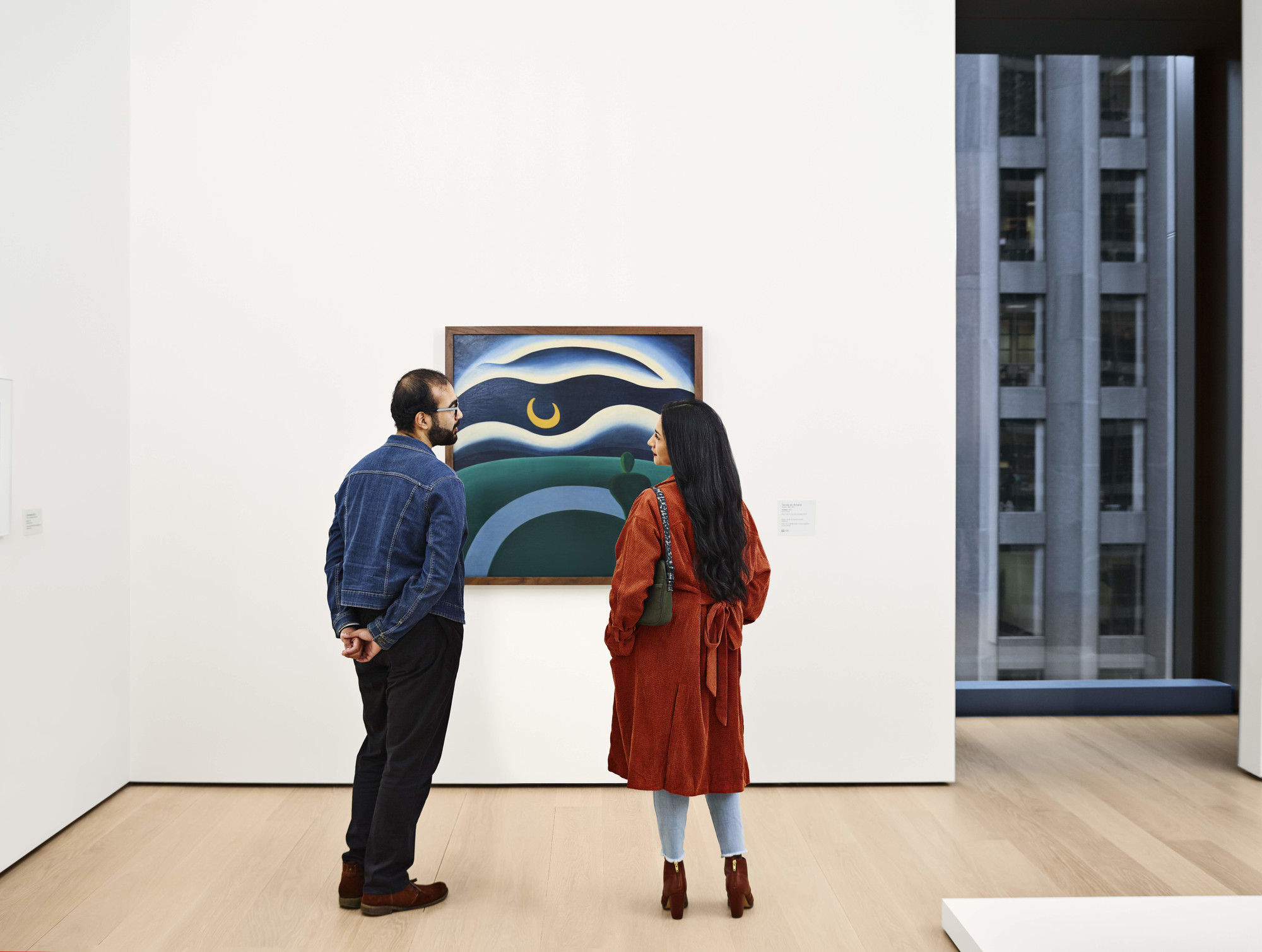 Visitors viewing art inside the Museum of Modern Art