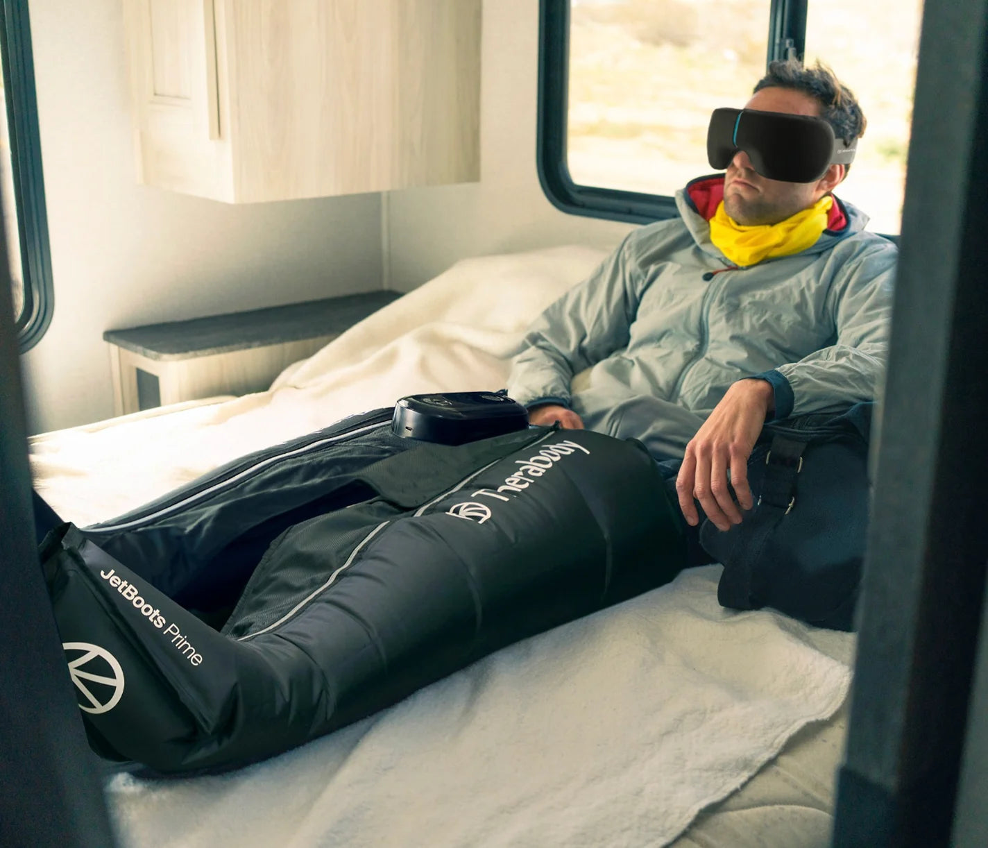Therabody JetBoots Prime worn while reclining